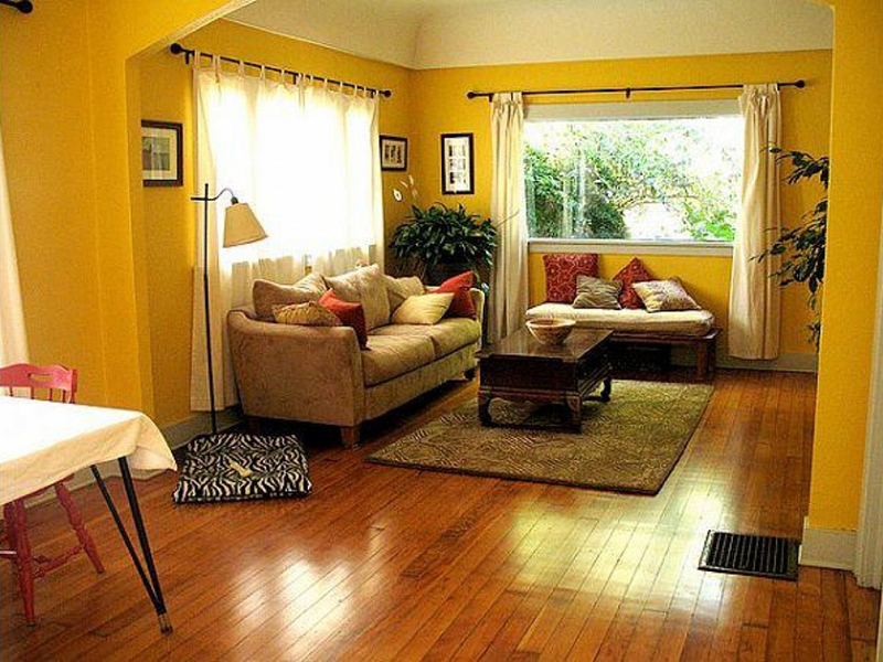 vàng cho thiết kế phòng khách là màu sơn nhà đẹp cho người mệnh Thổ