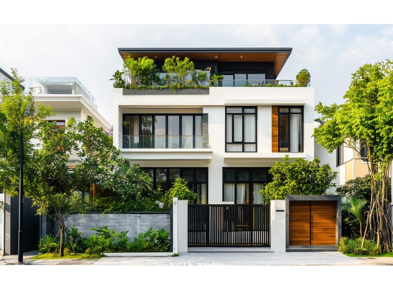 Kiến trúc nhà ở 2 tầng có tum hiện đại với cửa kính lớn