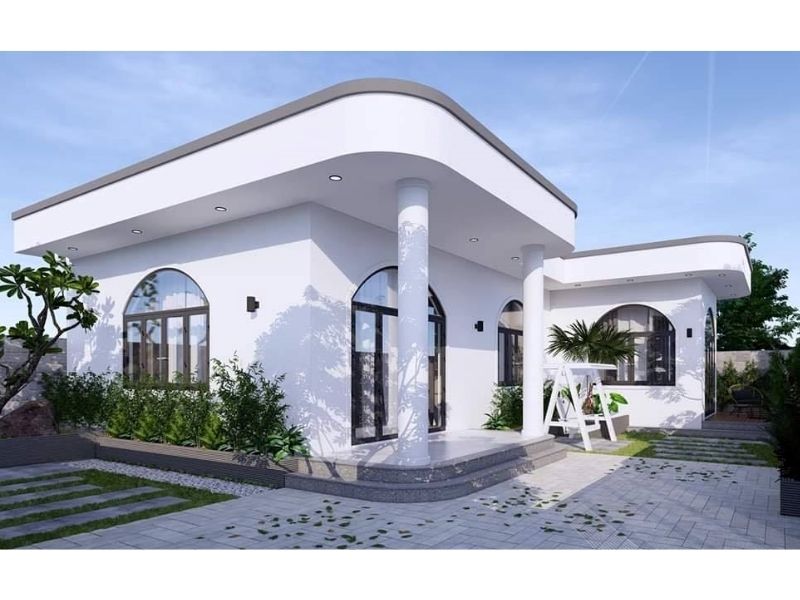 Vẻ ngoài mẫu nhà 1 tầng 4 phòng ngủ 150m2 nổi bật với tông màu trắng chủ đạo gợi vẻ đẹp thanh lịch, nhã nhặn