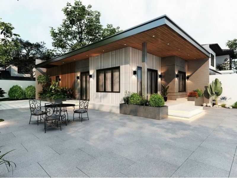 Kiến trúc mái bằng hiện đại kết hợp các vật liệu cao cấp tăng vẻ ngoài sang trọng của thiết kế nhà cấp 4 kết hợp kinh doanh 2 phòng ngủ