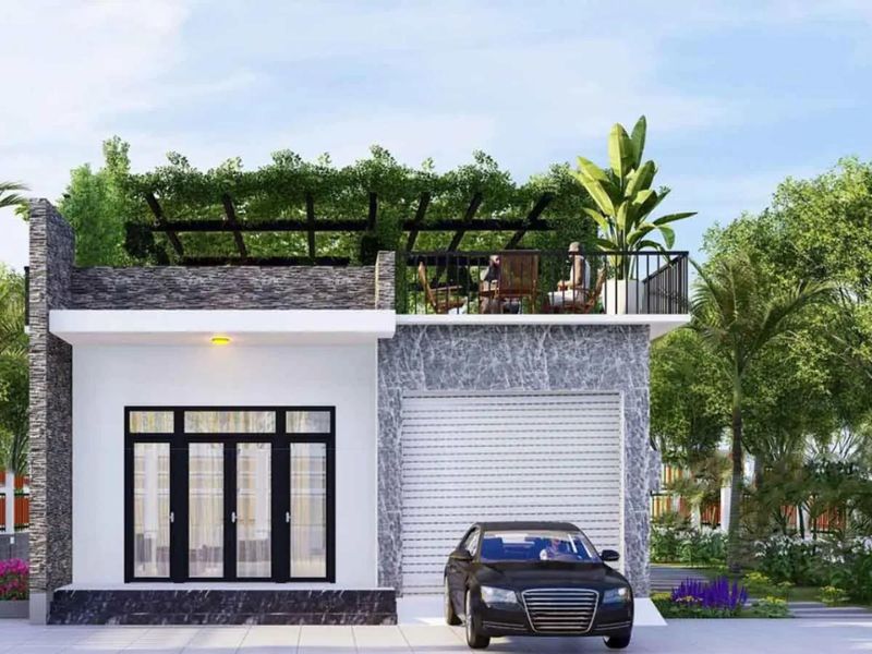 Ấn tượng với mẫu nhà cấp 4 mái bằng kết hợp kinh doanh có sân thượng xanh mát, thoáng đãng và gara để xe tiện lợi