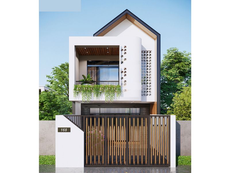 Mẫu nhà phố 2 tầng trang trí mặt tiền bằng gạch đá hoa gió