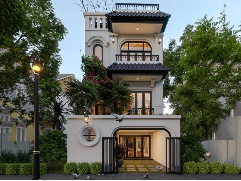 Nhà 3 tầng 7x12m indochine sử dụng kiến trúc vòm đặc trưng, chi tiết trang trí tinh tế, mái ngói truyền thống, màu sắc dịu nhẹ hài hòa với thiên nhiên 